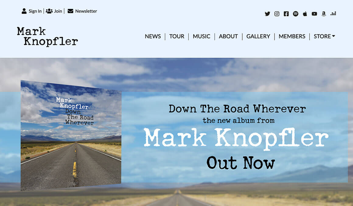 Screenshot of Mark Knopfler's 2019 website with a light blue colour theme. Photo of an empty road leading to the far-off horizon. Text reads Down the Road Wherever the new album from Mark Knopfler out now.